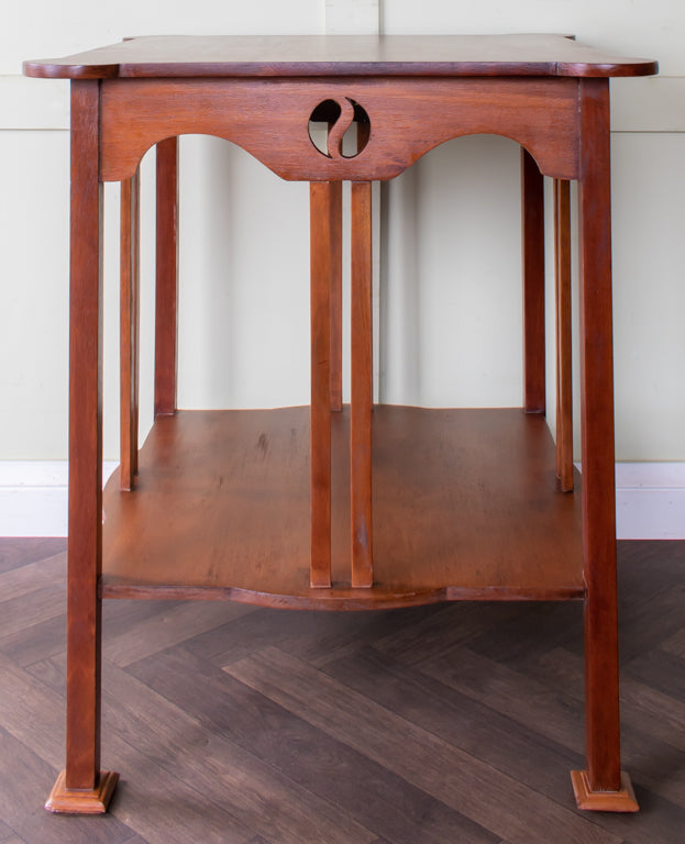 Wooden side table with a plain background